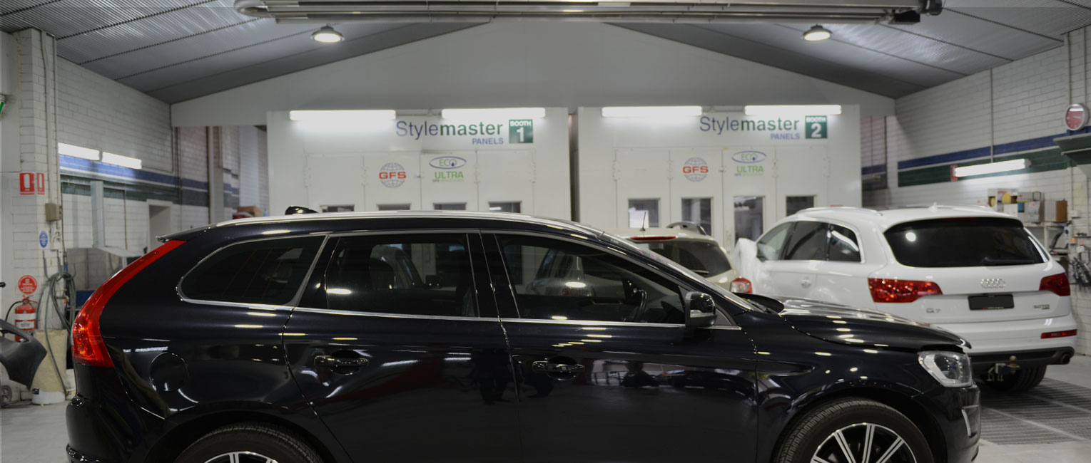 Prestige vehicles inside the Stylemaster Panels Richmond workshop